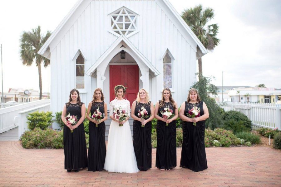 Bride and bridesmaids at the Little White Wedding Chapel at Beaches Museum