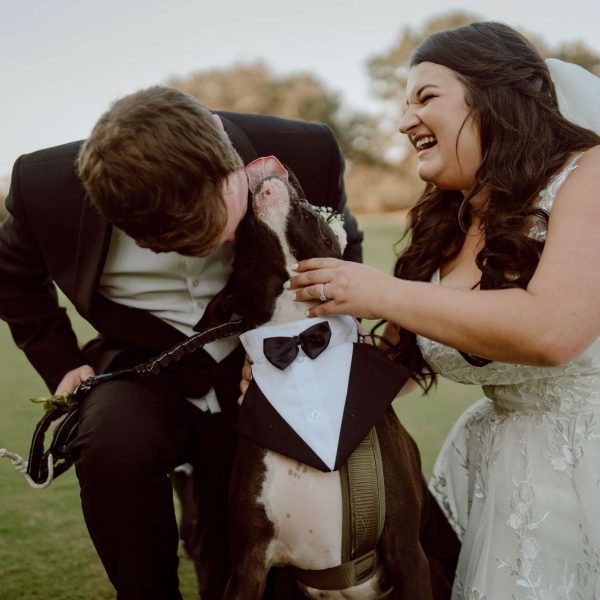 A bride and groom and their best dog friend at The Golf Club of Amelia Island - Premier Bride 904