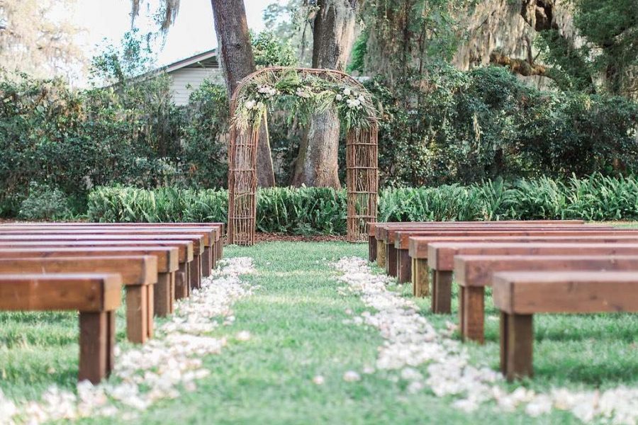Ceremony bench and arch rentals from All About Events Jacksonville