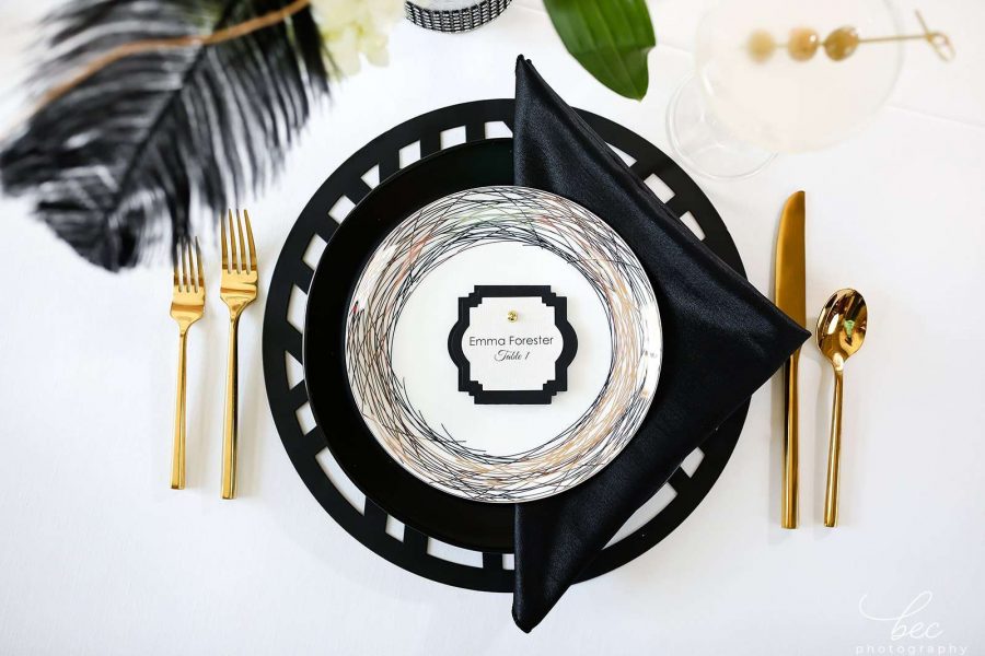 Modern Glam place setting by All About Events Jacksonville in Black and Gold