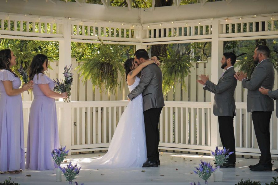 bride and groom first kiss with Estory Video Premier Bride 904
