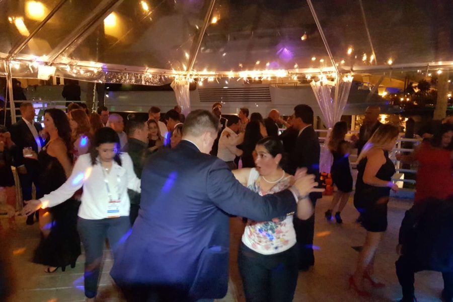 wedding guests dancing on the dance floor with Music by Vince - Premier Bride Jacksonville