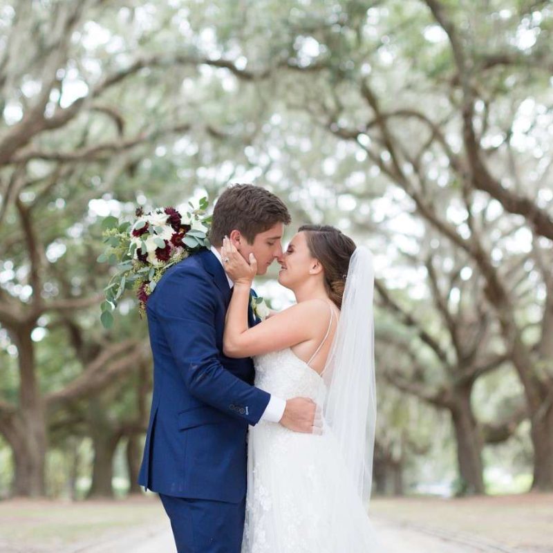Bride and groom photo under live oak trees in Jacksonville by becphotography